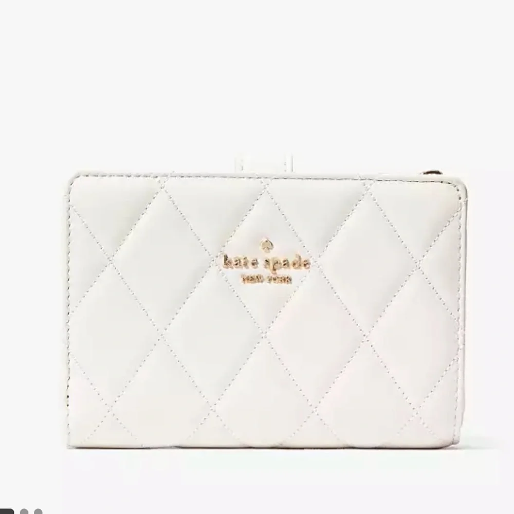 KATE SPADE Carey Medium Compact Bifold Wallet Parchment Color